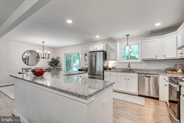 Chandelier, Interior, Kitchen, Pendant Lights, Recessed Lighting, Stainless Steel Appliances, Wood Texture Flooring