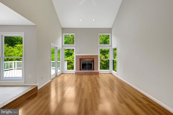 Empty room, Fireplace, Interior, Recessed Lighting, Wood Texture Flooring