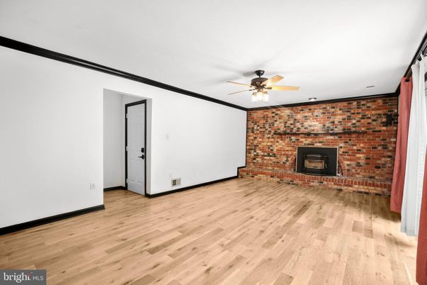 Empty room, Fireplace, Interior, Stone Walls, Wood Texture Flooring