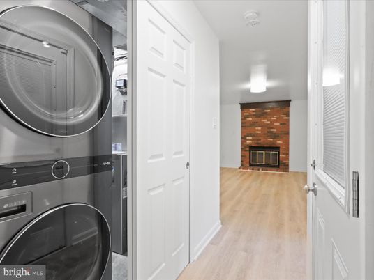 Fireplace, Interior, Stone Walls, Utility Closets, Washer, Wood Texture Flooring