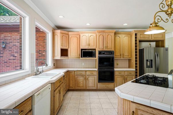 Interior, Kitchen, Pendant Lights, Recessed Lighting, Stone Walls, Tile Countertops