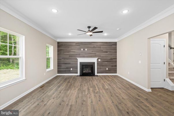 Empty room, Fireplace, Interior, Recessed Lighting, Wood Texture Flooring, Wooden Walls