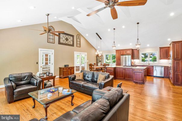 Chandelier, Dining room, Interior, Kitchen, Living room, Pendant Lights, Recessed Lighting, Stainless Steel Appliances, Wood Texture Flooring