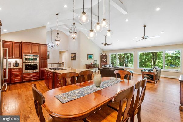 Dining room, Interior, Kitchen, Living room, Pendant Lights, Recessed Lighting, Stainless Steel Appliances, Wood Texture Flooring