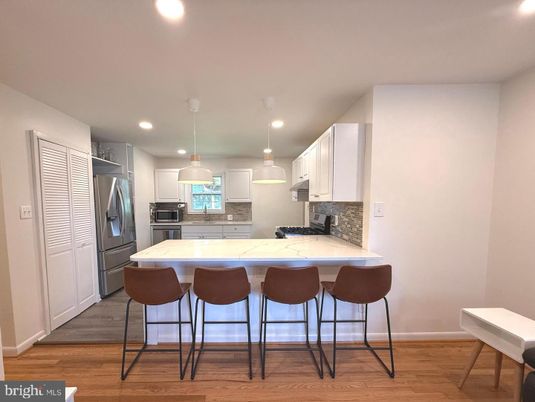 Interior, Kitchen, Pendant Lights, Recessed Lighting, Stainless Steel Appliances, Wood Texture Flooring