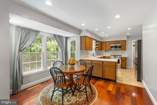 Dining room, Interior, Kitchen, Recessed Lighting, Stainless Steel Appliances, Wood Texture Flooring