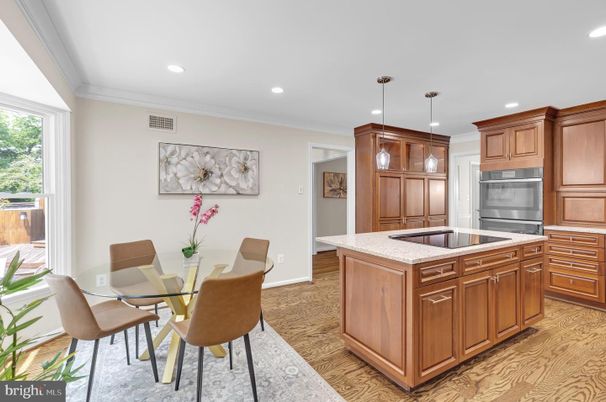 Dining room, Interior, Kitchen, Pendant Lights, Recessed Lighting, Stainless Steel Appliances, Wood Texture Flooring