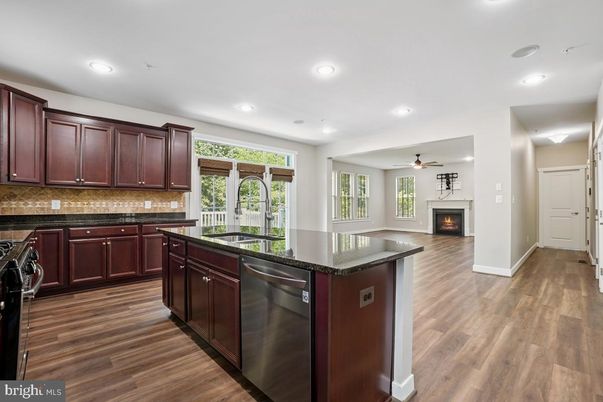 Fireplace, Interior, Kitchen, Recessed Lighting, Wood Texture Flooring