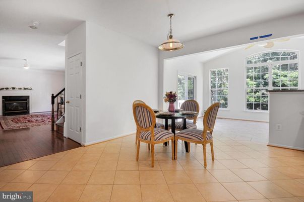 Dining room, Fireplace, Interior, Pendant Lights, Wood Texture Flooring