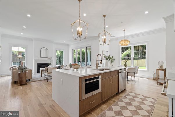 Dining room, Fireplace, Interior, Kitchen, Living room, Pendant Lights, Recessed Lighting, Stainless Steel Appliances, Wood Texture Flooring