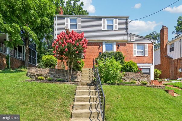 Attached, Exterior, Facade, Brick Facade, American Foursquare