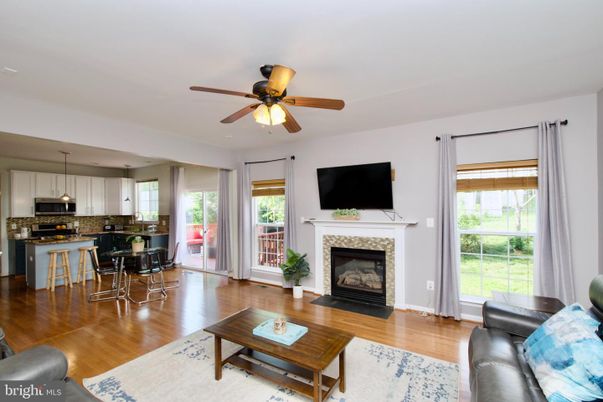 Dining room, Fireplace, Interior, Kitchen, Living room, Pendant Lights, Wood Texture Flooring