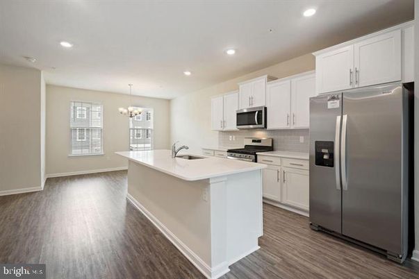 Chandelier, Interior, Kitchen, Recessed Lighting, Stainless Steel Appliances, Wood Texture Flooring