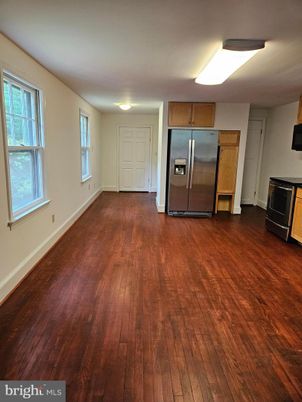 Empty room, Interior, Kitchen, Stainless Steel Appliances, Wood Texture Flooring
