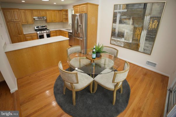 Dining room, Interior, Kitchen, Recessed Lighting, Stainless Steel Appliances, Wood Texture Flooring