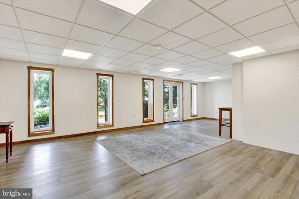 Empty room, Interior, Recessed Lighting, Stone Walls, Wood Texture Flooring