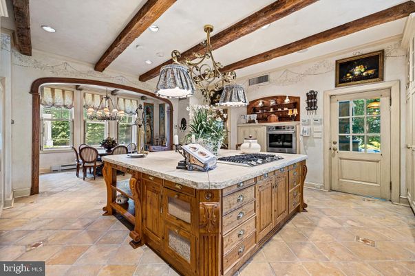 Chandelier, Dining room, Interior, Kitchen, Pendant Lights, Recessed Lighting, Stainless Steel Appliances, Wooden Beams