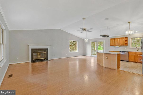Chandelier, Empty room, Fireplace, Interior, Kitchen, Pendant Lights, Wood Texture Flooring