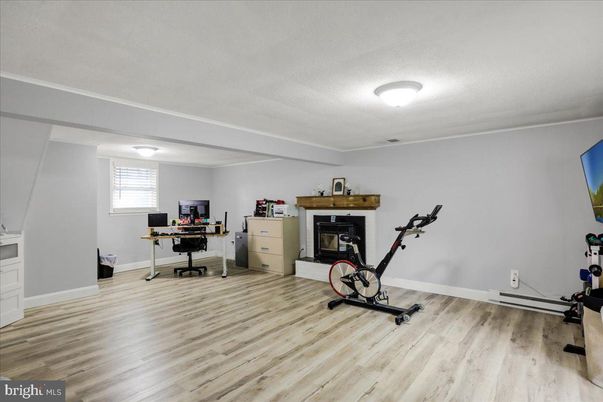 Fireplace, Fitness Equipment, Home Office, Interior, Wood Texture Flooring