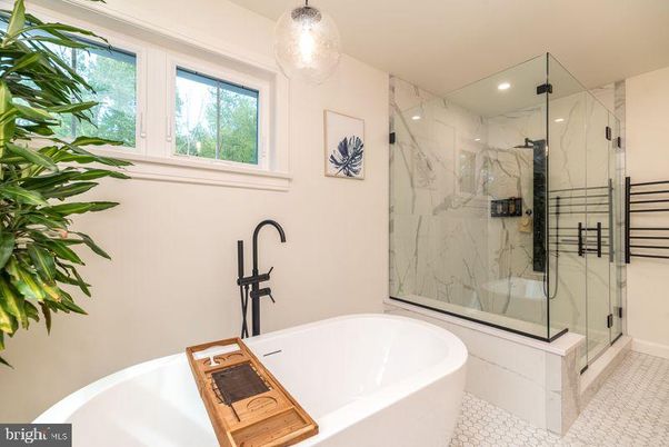 Bathroom, Free Standing Baths, Glass Shower, Interior, Marble Walls, Pendant Lights, Recessed Lighting
