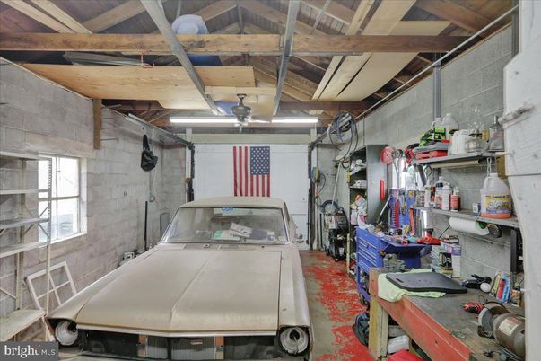 Garage, Interior, Stone Walls, Wooden Beams