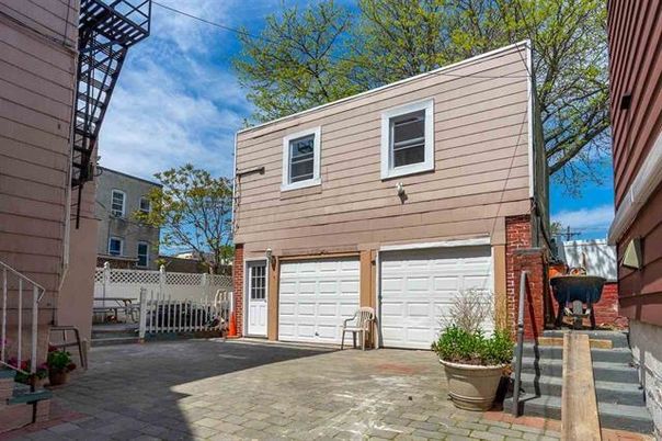 Attached, Exterior, Facade, Brick Facade, None