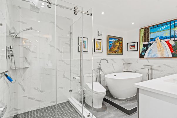 Bathroom, Free Standing Baths, Glass Shower, Interior, Marble Walls, Recessed Lighting