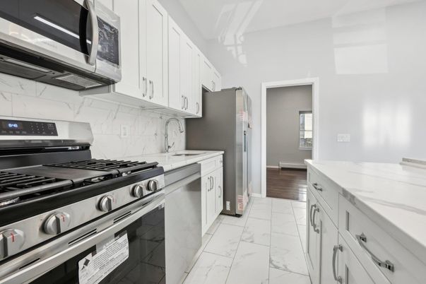 Interior, Kitchen, Marble, Marble Walls, Stainless Steel Appliances, Wood Texture Flooring