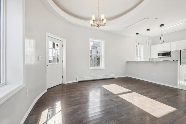 Chandelier, Empty room, Interior, Kitchen, Pendant Lights, Stainless Steel Appliances, Wood Texture Flooring