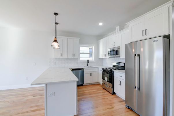 Interior, Kitchen, Pendant Lights, Recessed Lighting, Stainless Steel Appliances, Wood Texture Flooring