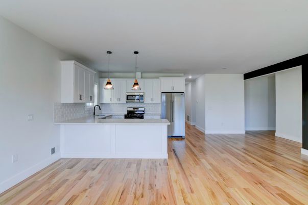 Interior, Kitchen, Pendant Lights, Recessed Lighting, Stainless Steel Appliances, Wood Texture Flooring