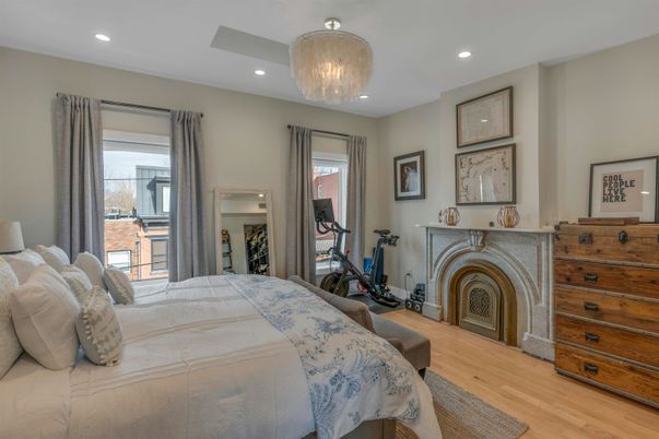 Bedroom, Chandelier, Fireplace, Fitness Equipment, Interior, Recessed Lighting, Wood Texture Flooring