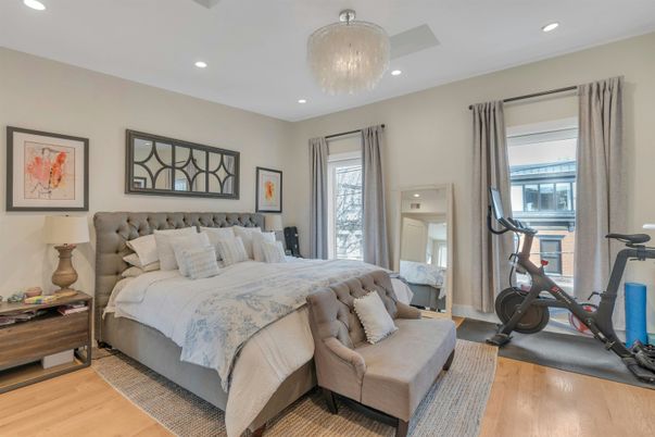 Bedroom, Chandelier, Fitness Equipment, Interior, Recessed Lighting, Wood Texture Flooring