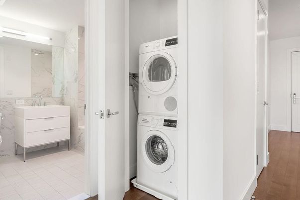 Interior, Marble Walls, Utility Closets, Washer, Wood Texture Flooring