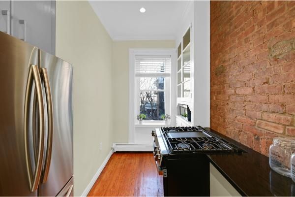 Interior, Kitchen, Recessed Lighting, Stainless Steel Appliances, Stone Walls, Wood Texture Flooring