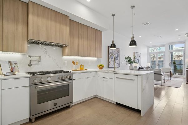 Dining room, Interior, Kitchen, Marble Walls, Pendant Lights, Recessed Lighting, Stainless Steel Appliances, Wood Texture Flooring