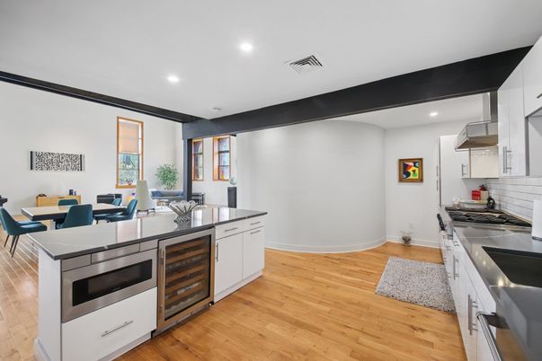 Dining room, Interior, Kitchen, Recessed Lighting, Stainless Steel Appliances, Wood Texture Flooring