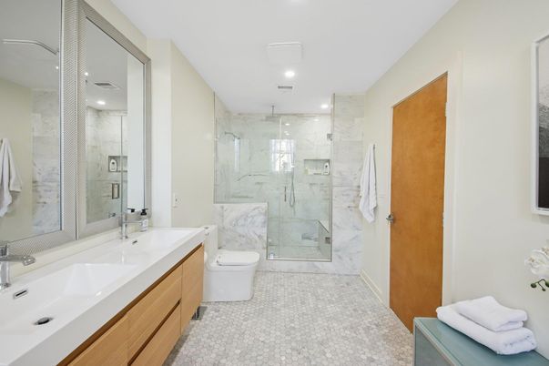 Bathroom, Dual Sink Vanities, Glass Shower, Interior, Marble Walls, Recessed Lighting