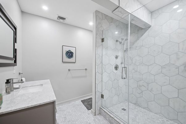 Bathroom, Glass Shower, Interior, Marble Walls, Recessed Lighting, Stone Walls