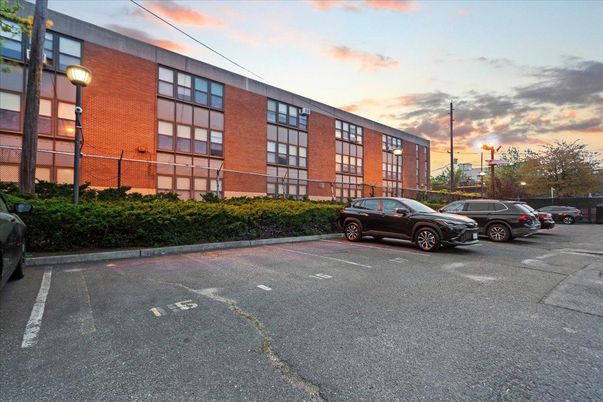 Exterior, Facade, Brick Facade, Condo Building