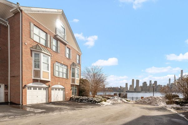 Attached, Exterior, Facade, Brick Facade, Water, Rowhouse