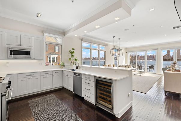 Dining room, Interior, Kitchen, Pendant Lights, Recessed Lighting, Stainless Steel Appliances, Water, Wood Texture Flooring