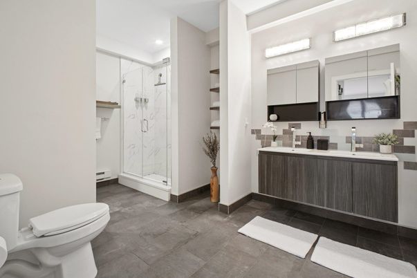 Bathroom, Dual Sink Vanities, Glass Shower, Interior, Marble Walls, Recessed Lighting
