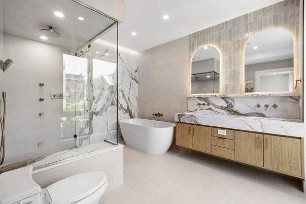 Bathroom, Dual Sink Vanities, Free Standing Baths, Glass Shower, Interior, Marble Walls, Recessed Lighting