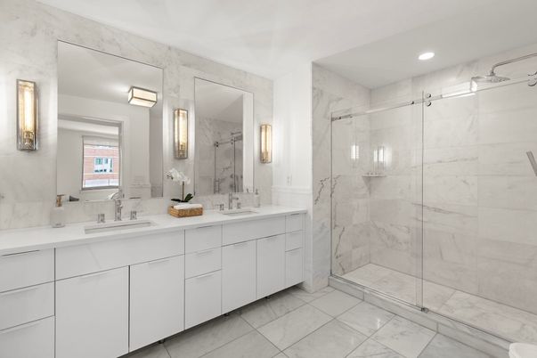 Bathroom, Dual Sink Vanities, Glass Shower, Interior, Marble, Marble Walls, Recessed Lighting