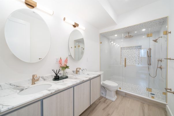 Bathroom, Dual Sink Vanities, Glass Shower, Interior, Recessed Lighting, Wood Texture Flooring