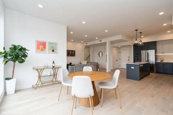 Dining room, Interior, Kitchen, Pendant Lights, Recessed Lighting, Stainless Steel Appliances, Wood Texture Flooring