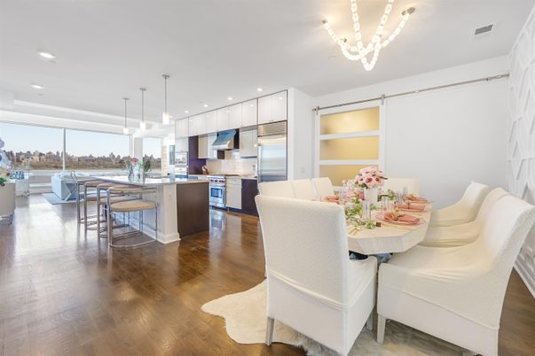 Chandelier, Dining room, Interior, Kitchen, Pendant Lights, Recessed Lighting, Stainless Steel Appliances, Wood Texture Flooring