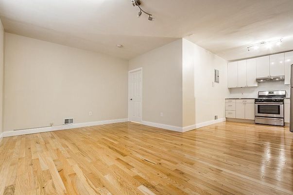 Empty room, Interior, Kitchen, Stainless Steel Appliances, Wood Texture Flooring