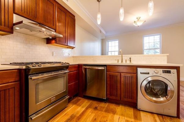 Interior, Kitchen, Pendant Lights, Stainless Steel Appliances, Washer, Wood Texture Flooring